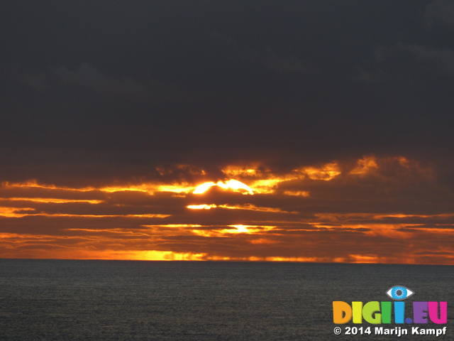 FZ010438 Sunset behind clouds at Worms head, Rhossili